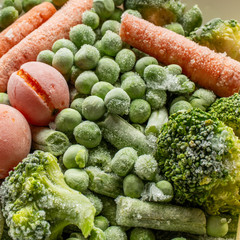 frozen vegetables: broccoli, cherry tomatoes, french bean, pea, carrot, top view - 267634220