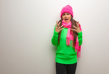 Young modern woman very scared and afraid