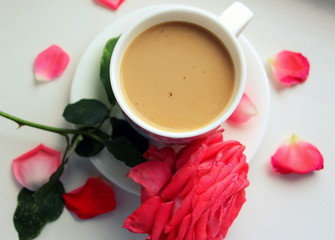  Beautiful and cute female cup of coffee and milk. Cappuccino and rose. Morning with coffee and flowers. Romance.