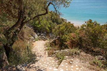 Stairs to the Agia Kyriaki beach in the Kiparissi Lakonia village, Peloponnese, Zorakas Bay, Greece.