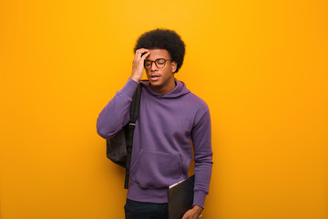 Young african american student man worried and overwhelmed
