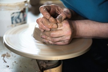 A lace maker and ceramicist create artwork