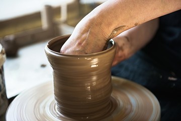 A lace maker and ceramicist create artwork