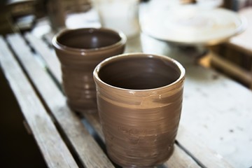 A lace maker and ceramicist create artwork