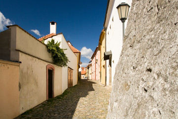 Narrow street in jewish quarter in heart of city Trebic