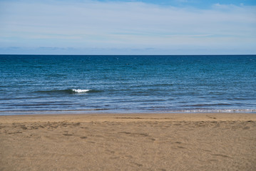 Quite sea on Playa grande in Puerto del Carmen, Lanztarote, Spain