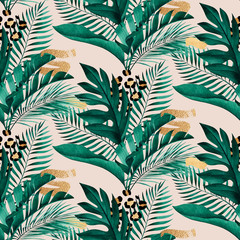 Tropical seamless pattern with exotic monstera, banana and palm leaves on white background.