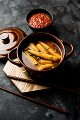 Baby Corn Manchurian with gravy - popular Indo-chinese recipe. selective focus