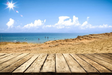 Summer day and wooden table background of free space. 