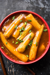 Baby Corn Manchurian with gravy - popular Indo-chinese recipe. selective focus