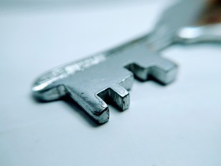 key stainless steel isolated on white background