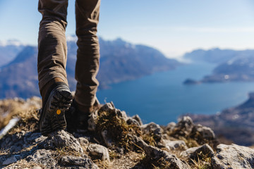 Italy, Como, detail of hiking boots on the rock