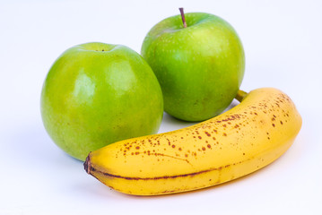 Green Apples and Banana on White BG with Copy Space