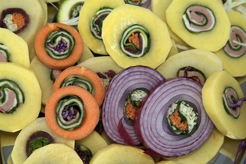 Sliced red onion rings isolated on white background.