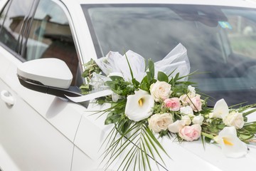 white wedding limousine with flower decoration