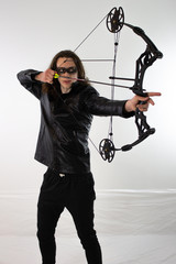 Mysterious man in black leather with bow