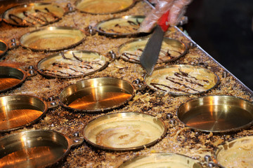 preparation of crispy pancakes at the night market - Kota Kinabalu Sabah Borneo Malaysia Asia