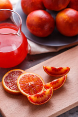 blood orange and juice on a dark background