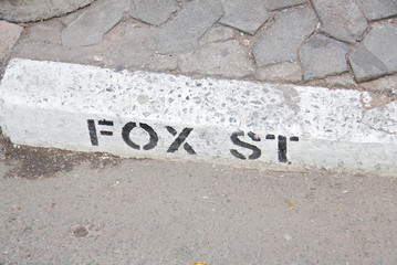 street name Fox sign on pavement