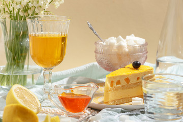 Mango pie slice on a table with lemon and sugar