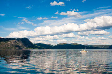 trip to nordkapp, view to a fjord with a boat