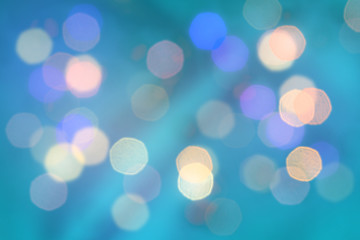 Abstract sea dark blue color blurred background. Unfocused festive backdrop with light bokeh