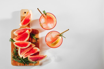 Homemade Cocktail making. Grapefruit and Rosemary cocktail.  Refreshing and non-alcoholic drink...