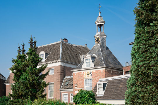 Gate Waterpoort with tower, clock and buildings, Tiel, The Netherlands