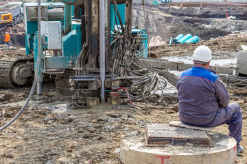 Construction site with machinery for drilling