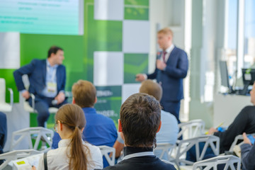 Audience listens to the lecturer at the conference