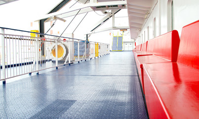ship deck on a big passenger ship with boxes with life vests