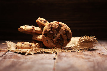 Chocolate cookies on wooden table. Chocolate chip cookies shot very delicious