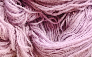 Color yarn for knitting, knitting wool balls . Beautiful yarn knitting background. Close up of multi colored kitting yarn.