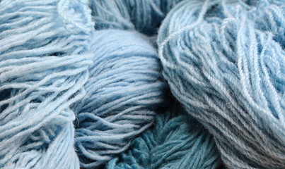 Color yarn for knitting, knitting wool balls . Beautiful yarn knitting background. Close up of multi colored kitting yarn.
