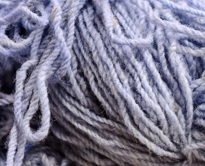 Color yarn for knitting, knitting wool balls . Beautiful yarn knitting background. Close up of multi colored kitting yarn.