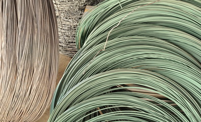 Industry wire roll up in storage. Construction Material - Roll of Metal Wire Strands/