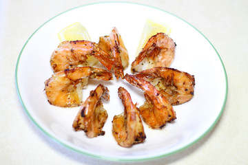 Delicious plate of shrimp cooked in butter and garlic.