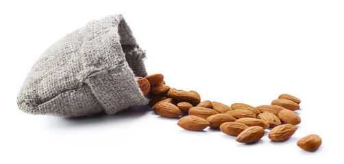 Burlap sack with almonds, isolated on white background
