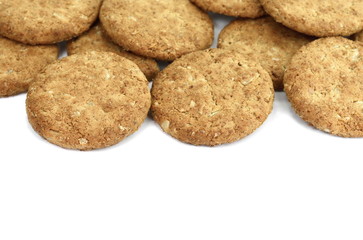 Round whole wheat biscuit, cookie with raisins isolated on white background. Biscuits with whole-wheat (wholemeal) flour isolated on white background 