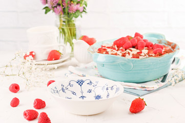Traditional Italian Dessert with Raspberry Berries , cocoa, coffee and cheese masakropone. Tirmisu for homemade breakfast. Free space for text.