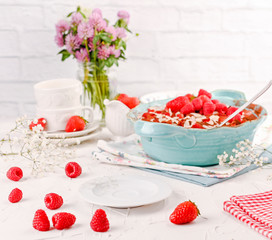 Traditional Italian cake with mascarpone cheese and berries. Tiramisu with raspberry berries and espresso coffee. Homemade breakfast on a white background. Copy space.