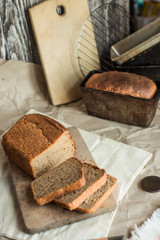 fresh homemade sourdough wheat form bread  served on the rustic background