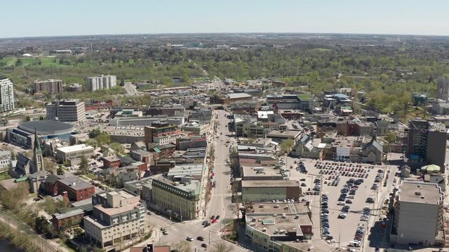 Guelph Ontario Canada 4k Aerial Drone of Downtown Wydnham Street and Surrounding Area, River and Cityscape. Shot Above the Main Street of City During Sunny Day