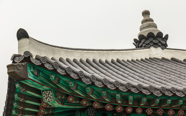 Fototapeta na wymiar Roof details of traditional korean Bell Pavilion in the Yongdusan Park. Jung-gu, Busan, South Korea, Asia.