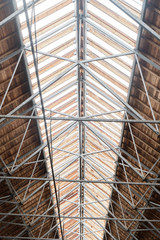 Fototapeta premium Wooden roof in the hangar for horses