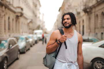 Obraz premium Young Afro handsome man walking in the city