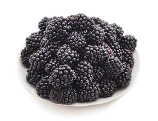Berries blackberries in a plate.