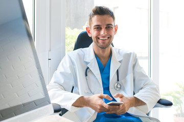 doctor or medical professional with uniform in the consultation or dispatch