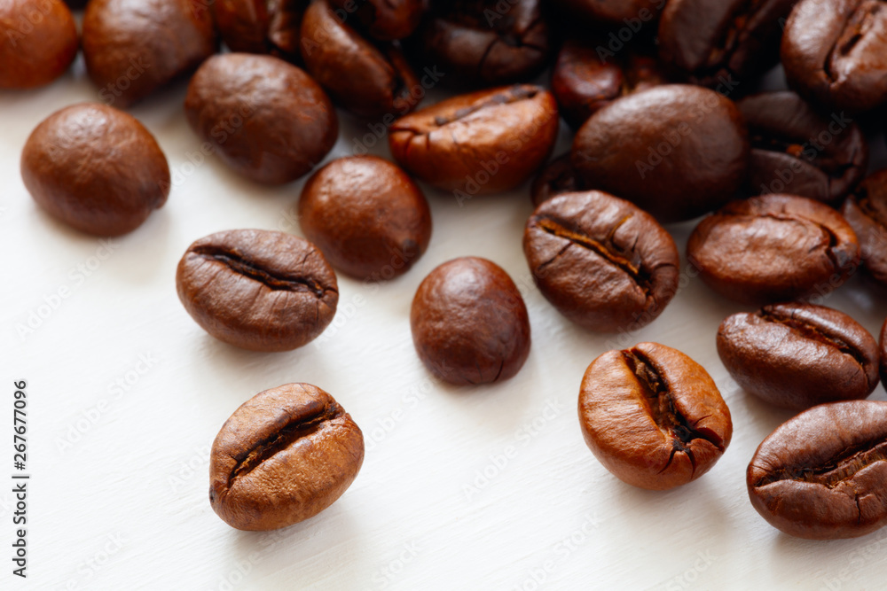 Poster Coffee  beans isolated on white background with copyspace for text. Coffee background or texture concept.