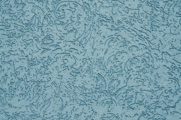Abstract ribbed pastel background. Blue embossed texture. Gray textured wall background. Grey pattern of trendy wallpaper. Light blue painted surface in modern style for decorative design.